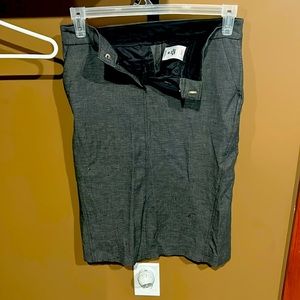 Off brand slight flair grey suit.